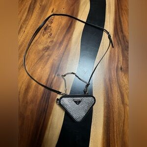 Prada Triangular Embellished satin and leather mini-pouch